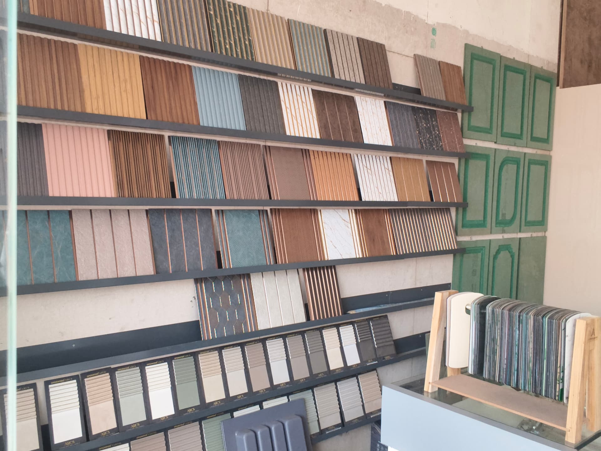 Decorative fluted panels and finish samples on display