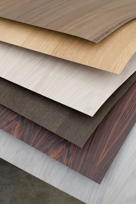 Layered decorative laminate sheets