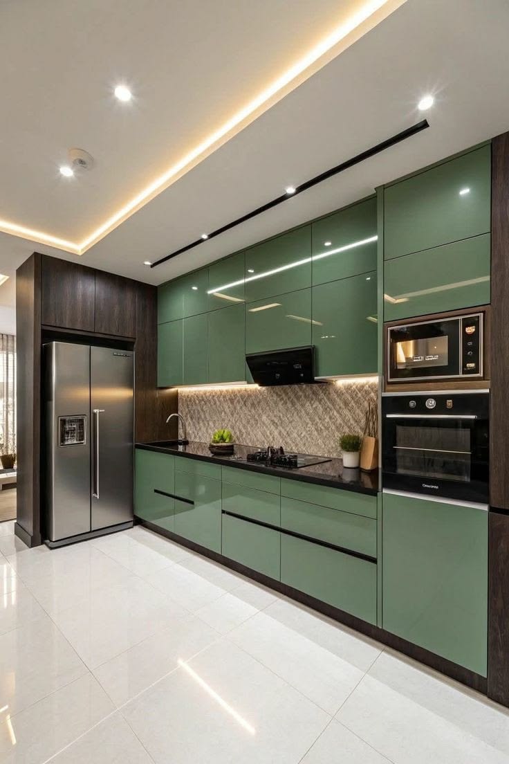 Glossy green modular kitchen with integrated appliances